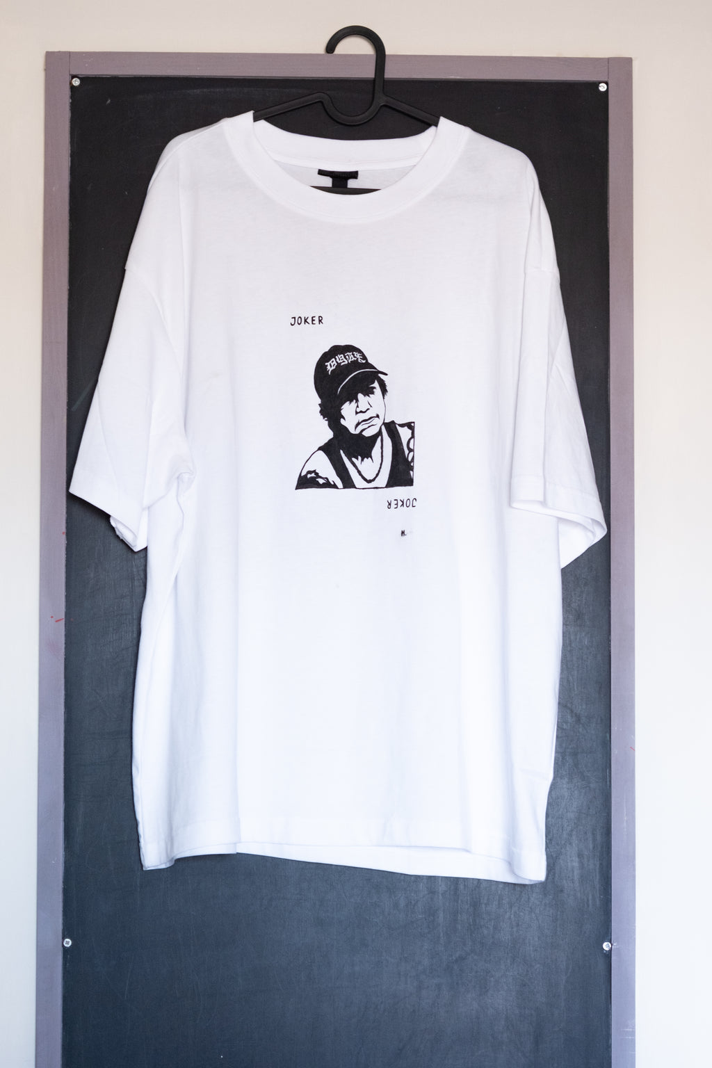 Handpainted T-shirt feat Cathy Opie, by Mila. Front. 
